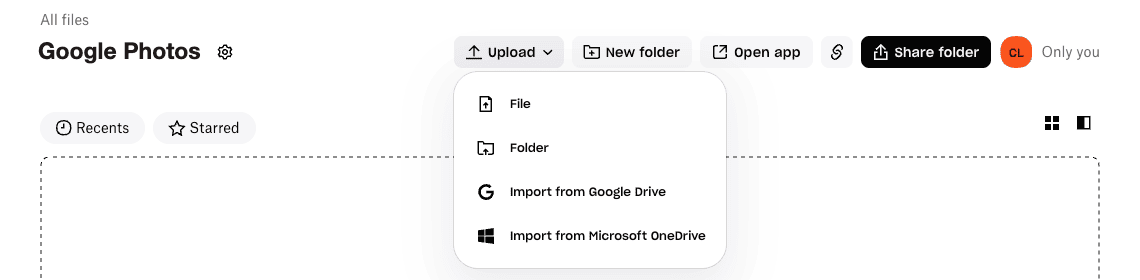 Dropbox folder Google Photos with the Upload menu open, listing File, Folder, Import from Google Drive and Import from Microsoft OneDrive